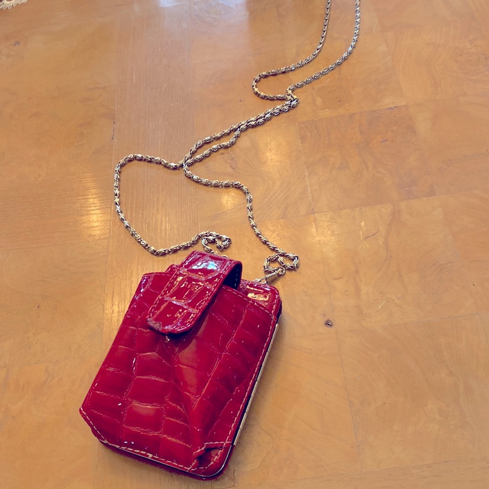 Red faux animal print wallet w silver shoulder strap